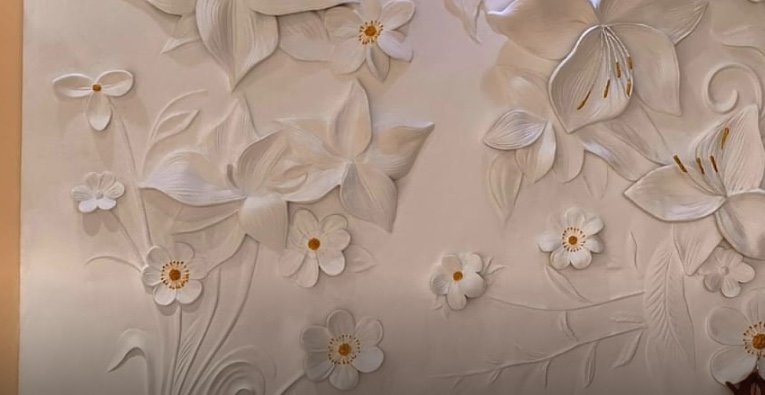 Blossom feature wall — relief mural hand-sculpted by Aadi Arts, Lucknow