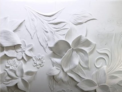 Botanical relief — feature wall hand-sculpted by Aadi Arts, Lucknow