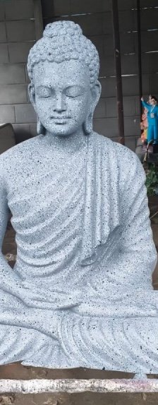Speckled stone Buddha statue by Lucknow sculptors Aadi Arts